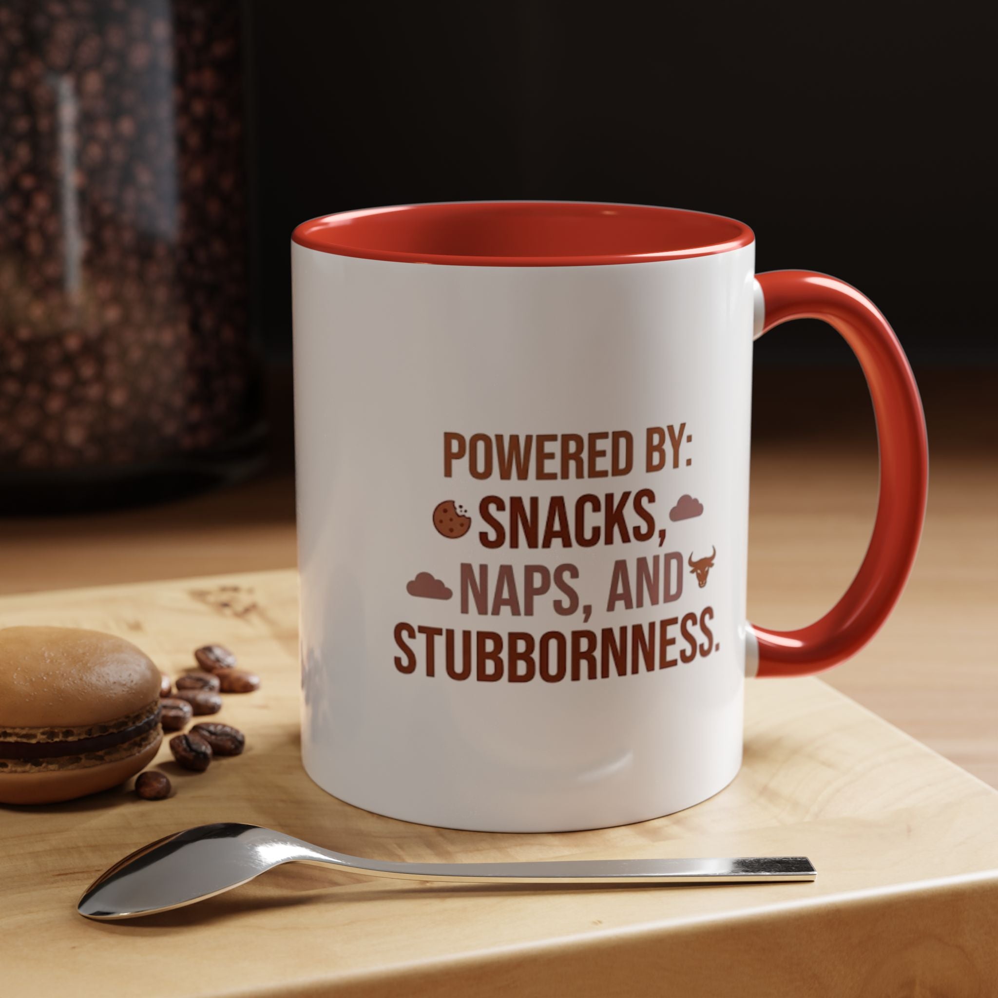 Coffee Mug — "Powered by: Snacks, Naps, and Stubbornness" Ceramic Accent Mug