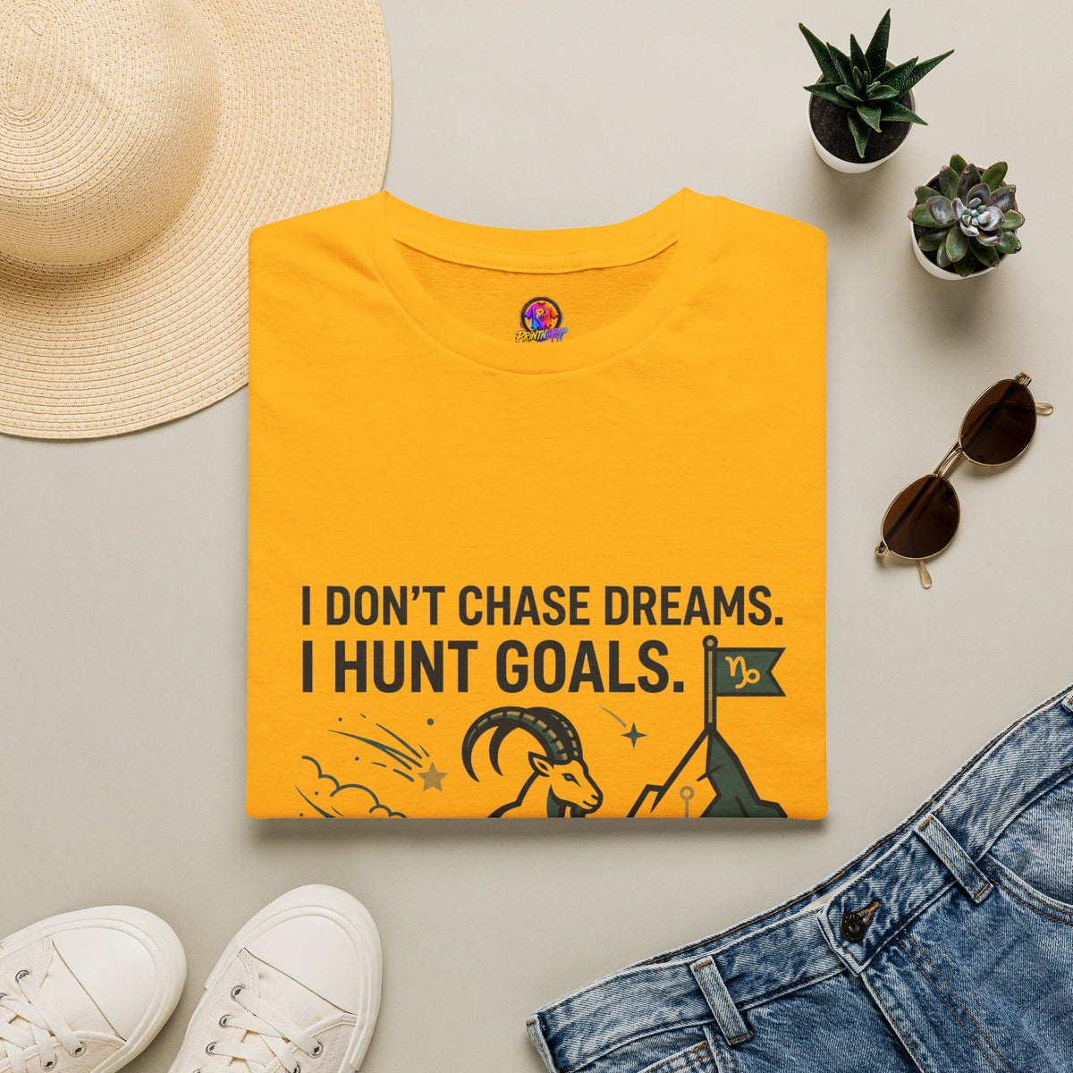 Capricorn T‑Shirt — I Don’t Chase Dreams, I Hunt Goals