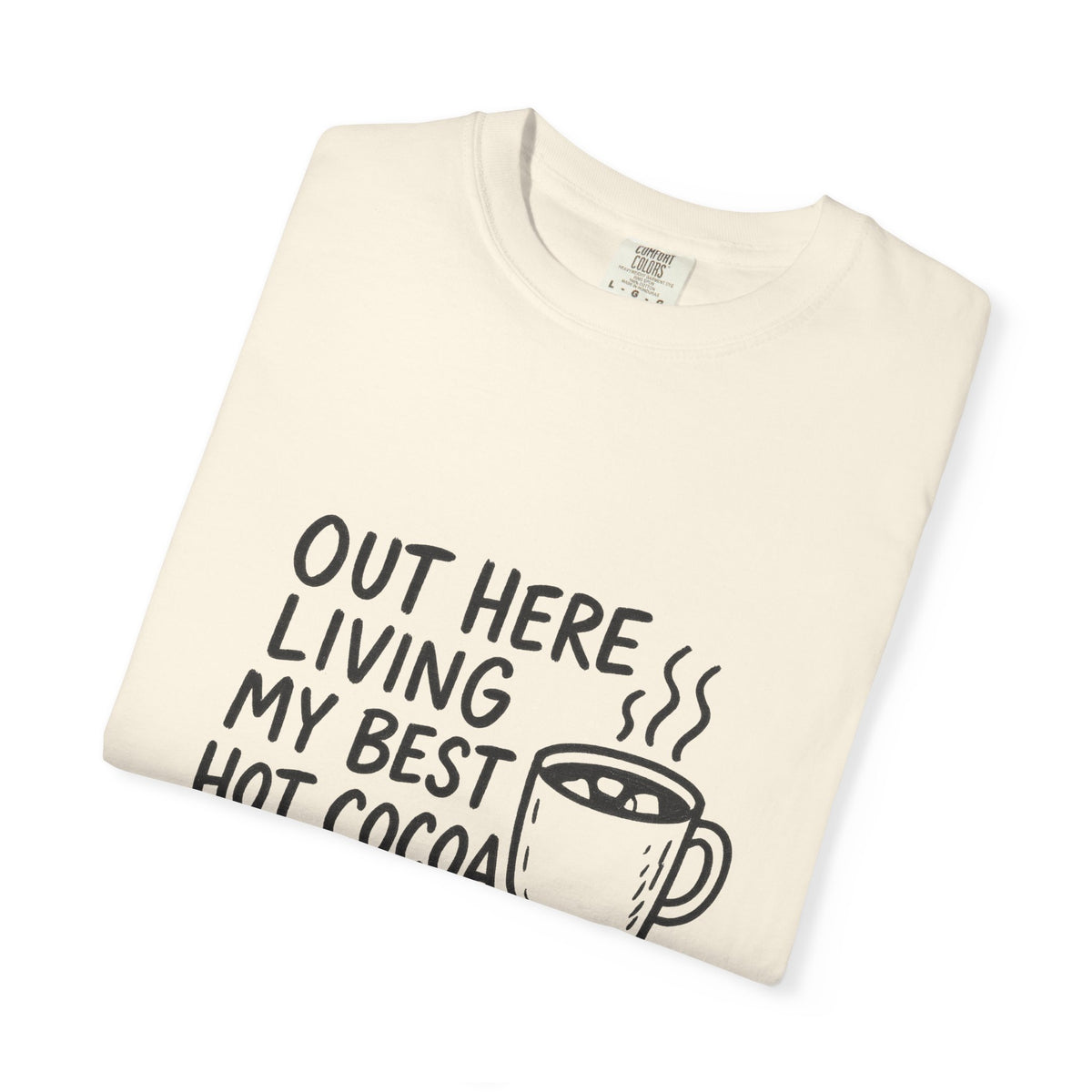 Hot Cocoa Life T-Shirt — "Out Here Living My Best Hot Cocoa Life" Cozy Graphic Tee - Trending Now - October 2026