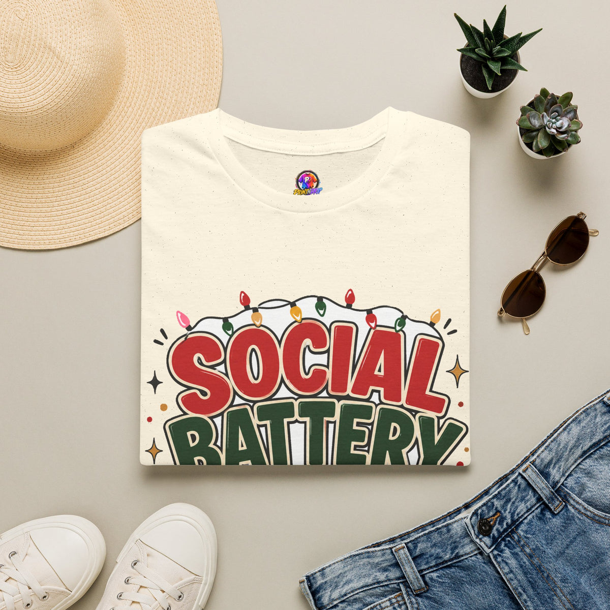 Social Battery Holiday T‑Shirt — Funny Christmas Recharge Graphic Tee