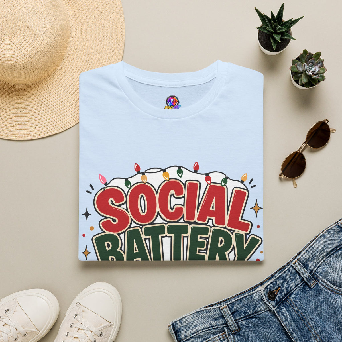 Social Battery Holiday T‑Shirt — Funny Christmas Recharge Graphic Tee