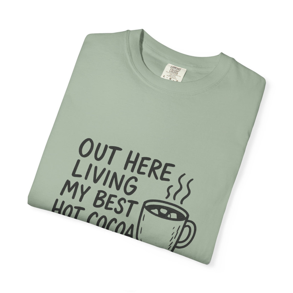 Hot Cocoa Life T-Shirt — "Out Here Living My Best Hot Cocoa Life" Cozy Graphic Tee - Trending Now - October 2026