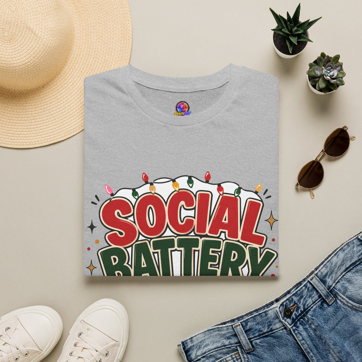 Social Battery Holiday T‑Shirt — Funny Christmas Recharge Graphic Tee