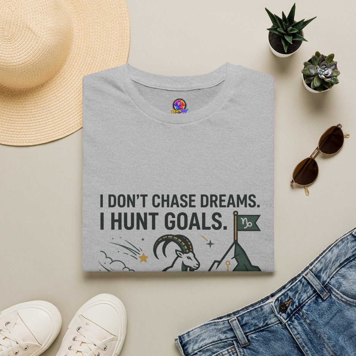 Capricorn T‑Shirt — I Don’t Chase Dreams, I Hunt Goals