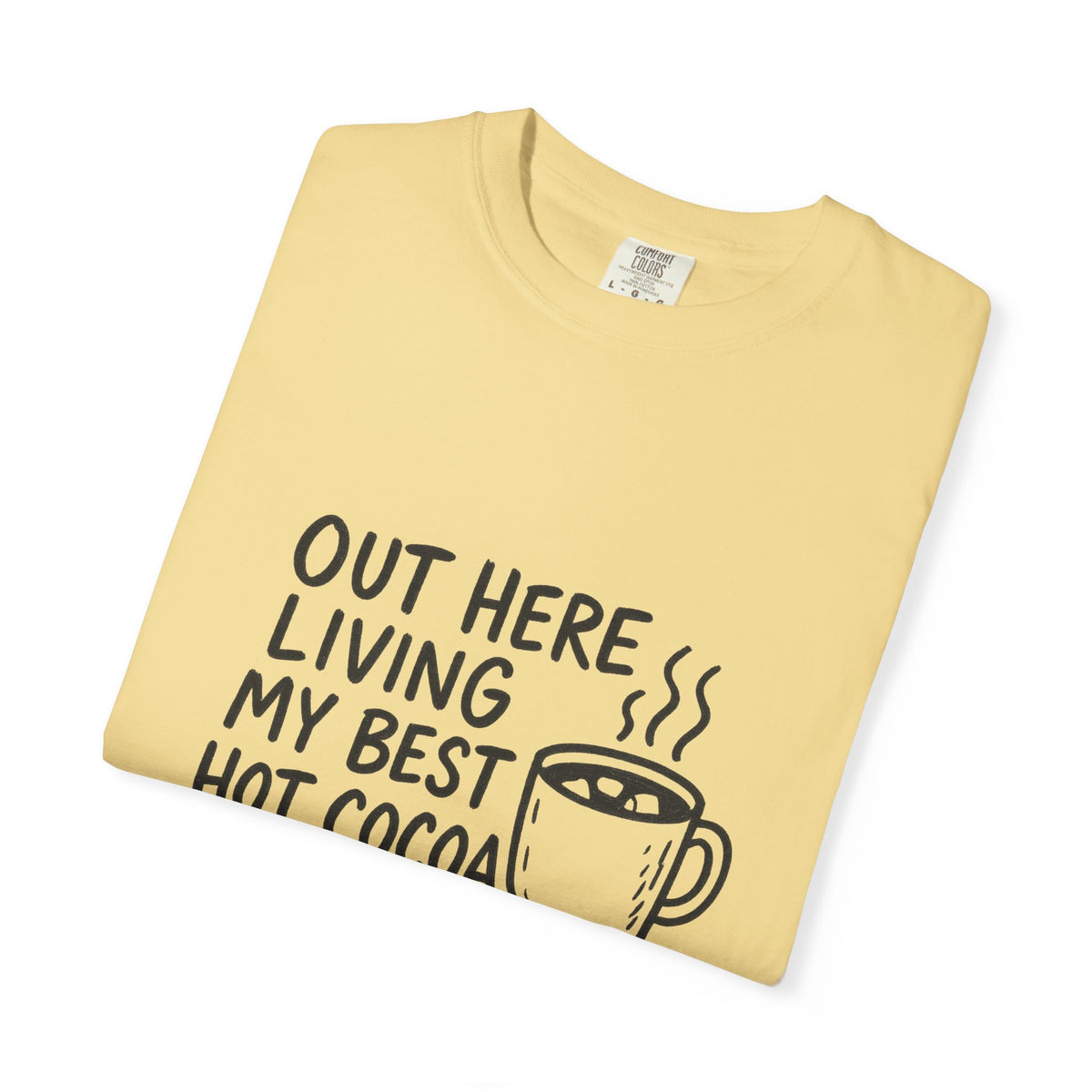 Hot Cocoa Life T-Shirt — "Out Here Living My Best Hot Cocoa Life" Cozy Graphic Tee - Trending Now - October 2026
